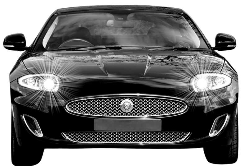 Front view of a sleek black Jaguar car with headlights on.